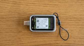 Top-down view of the Satechi Mini NVMe SSD Enclosure with an SSD installed inside