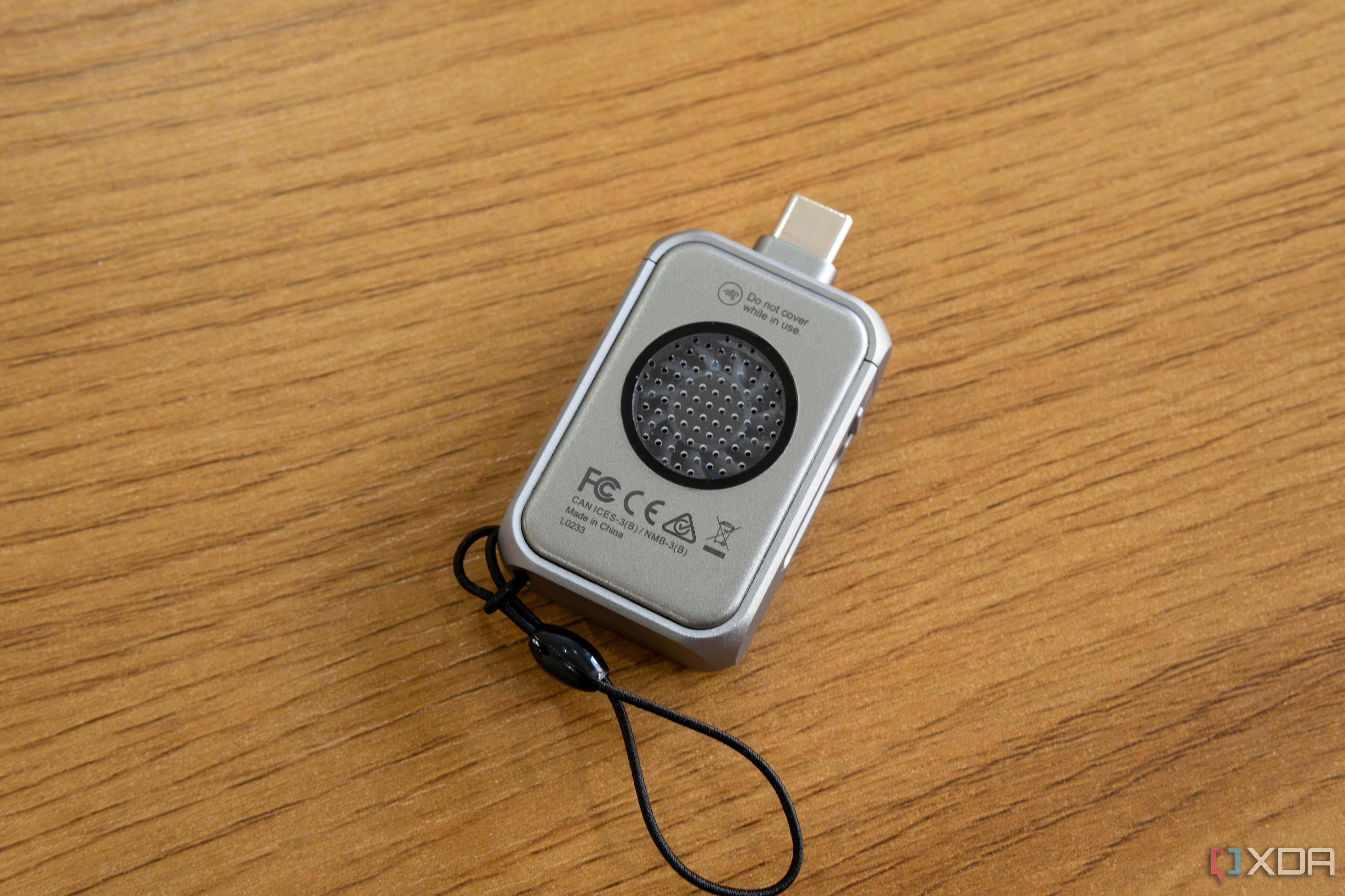 Angled overhead view of the Satechi Mini NVMe SSD Enclosure showing the cooling fan