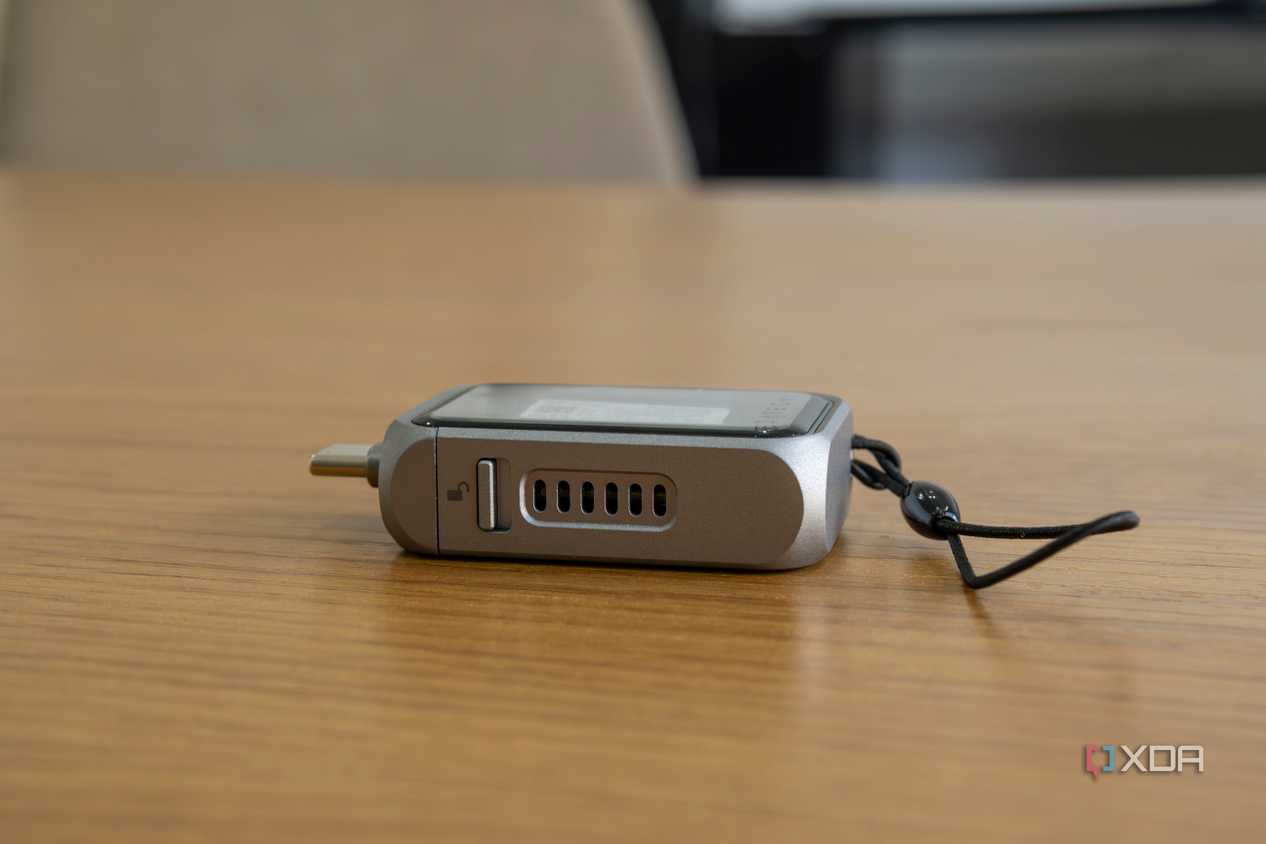 Side view of the Satechi Mini NVMe SSD Enclosure showing fan vents and the lock switch
