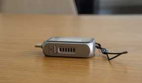 Side view of the Satechi Mini NVMe SSD Enclosure showing fan vents and the lock switch