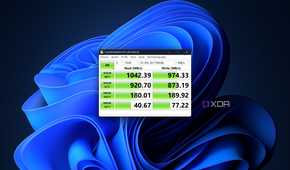 CrystalDiskMark test results for the Satechi Mini NVMe SSD enclosure on the Asus Zenbook S 14 using the extension cable