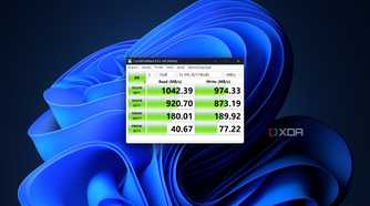 CrystalDiskMark test results for the Satechi Mini NVMe SSD enclosure on the Asus Zenbook S 14 using the extension cable