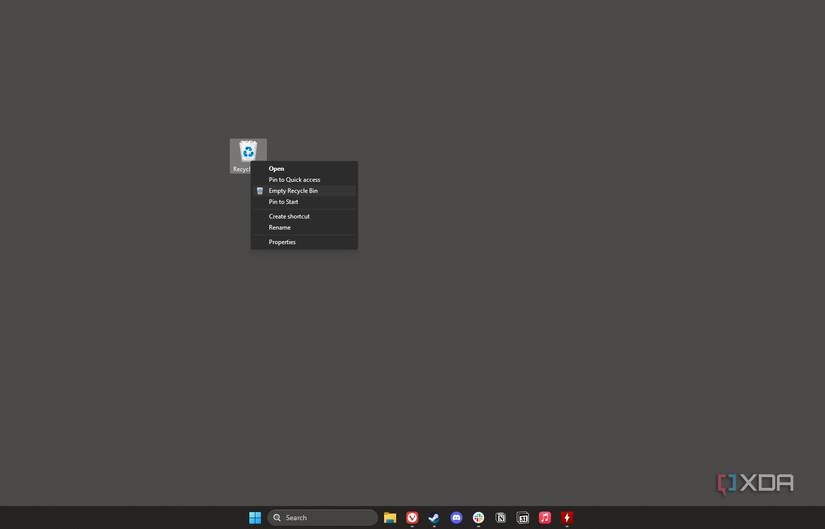 A screenshot showing the context menu for the Recycle Bin, with the Empty option highlighted