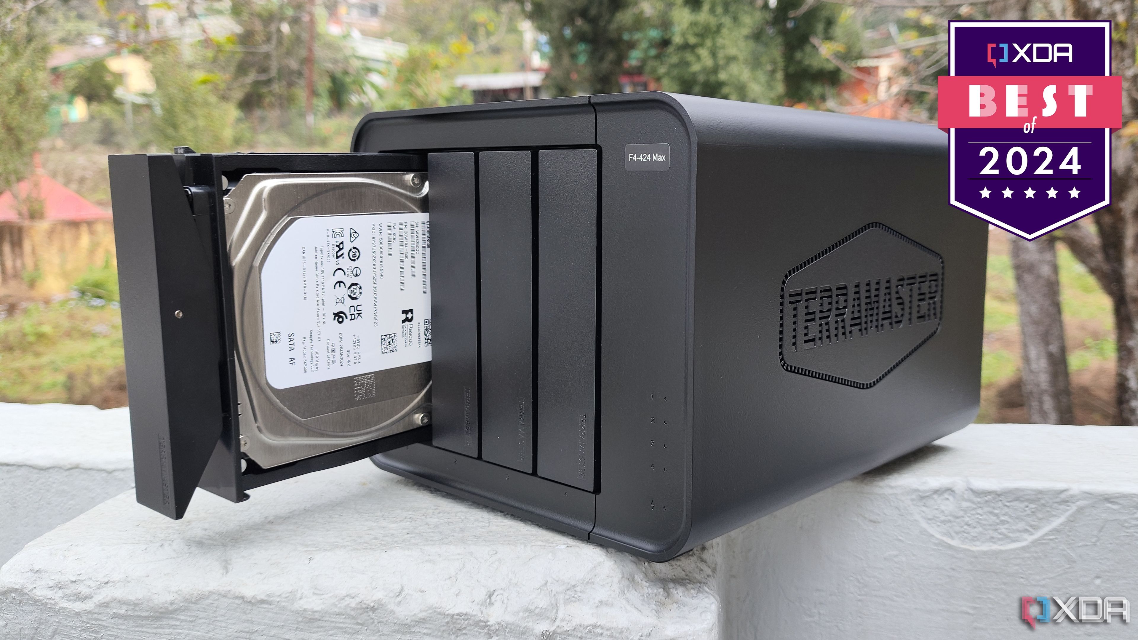 TerraMaster F4-424 on a stone wall with a badge reading XDA Best of 2024