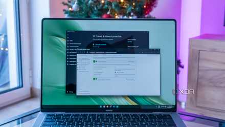 A Windows 11 laptop showing the settings pages for Windows firewall