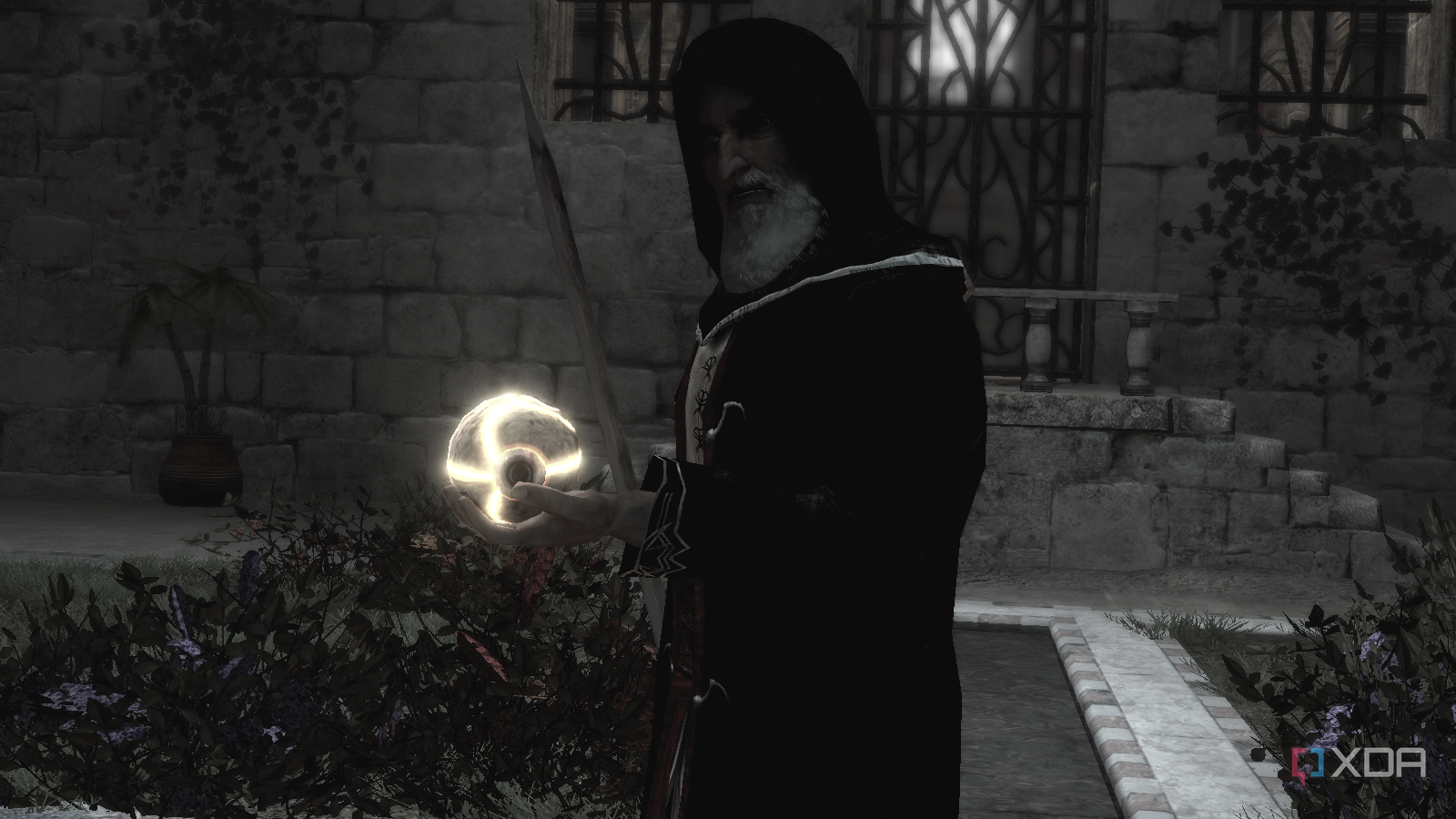 Al Mualim holding a Piece of Eden and talking to Altair