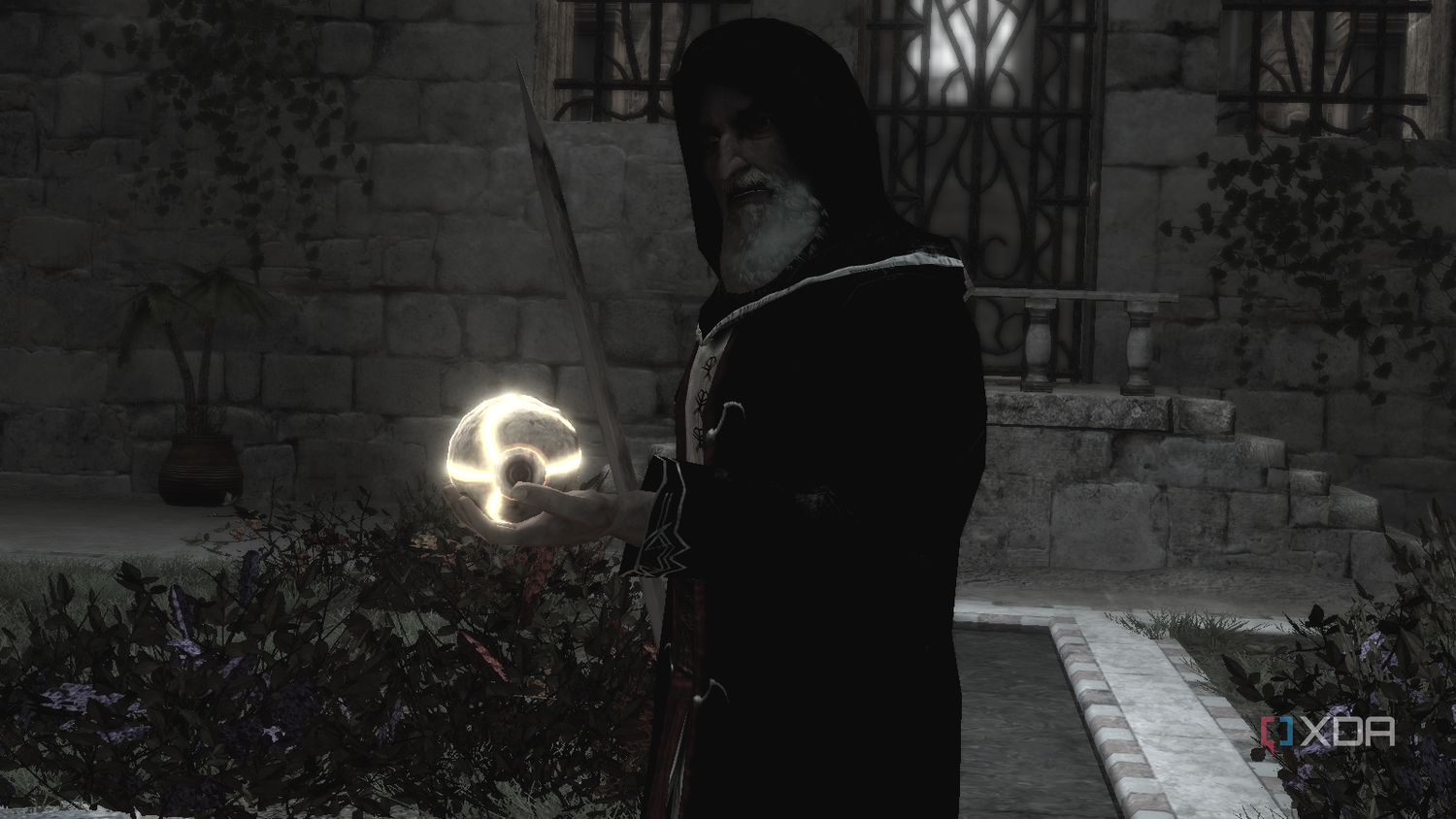 Al Mualim holding a Piece of Eden and talking to Altair