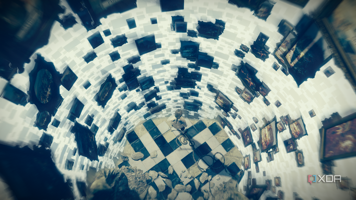 Top view of Arno looking down at a spiral of floating framed paintings in his Initiation hallucination sequence