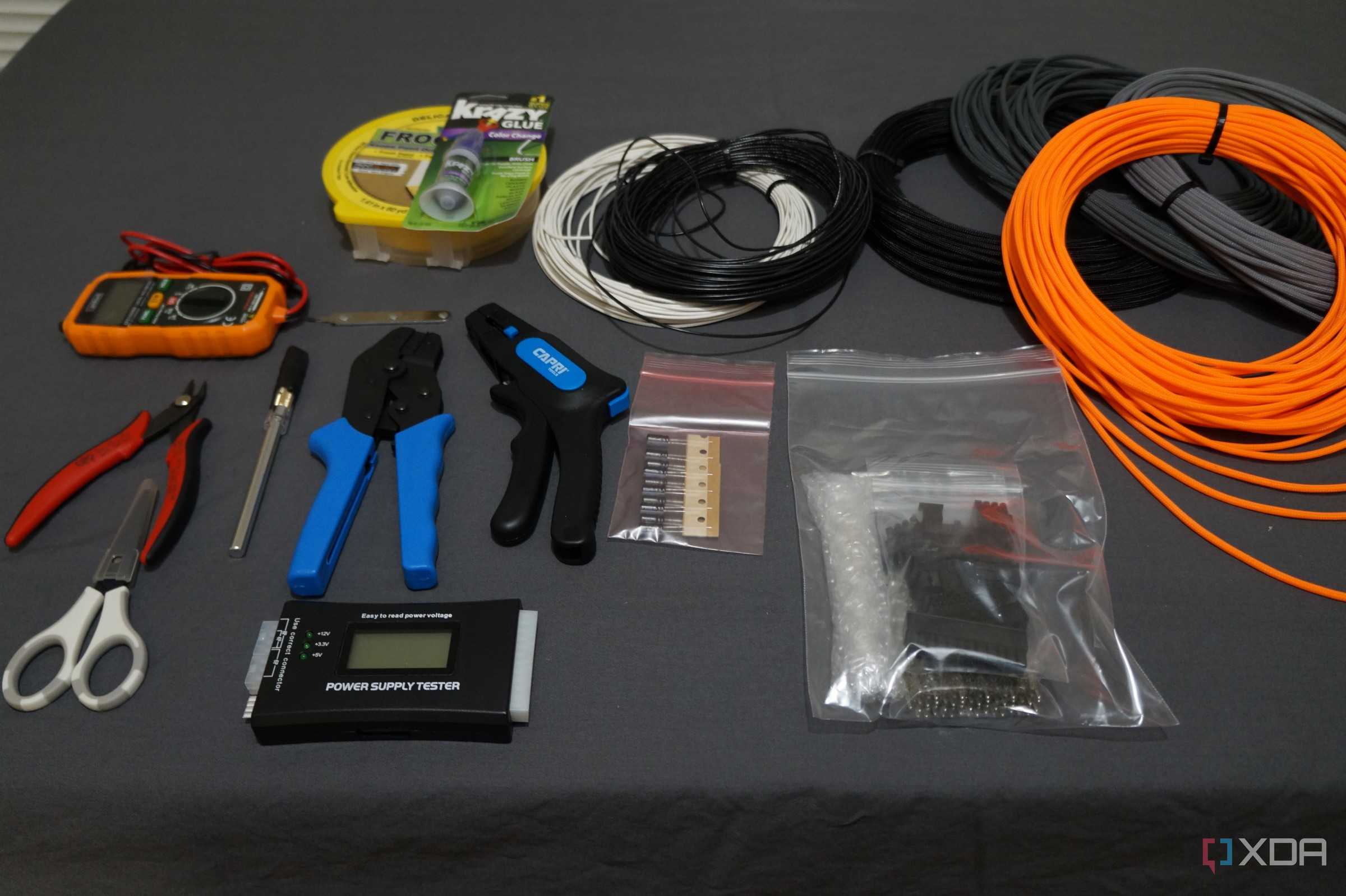 cable sleeving tools and supplies on a desktop