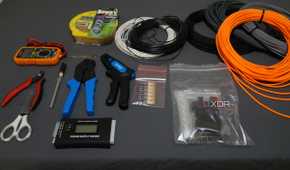 cable sleeving tools and supplies on a desktop
