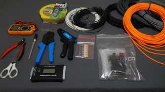 cable sleeving tools and supplies on a desktop