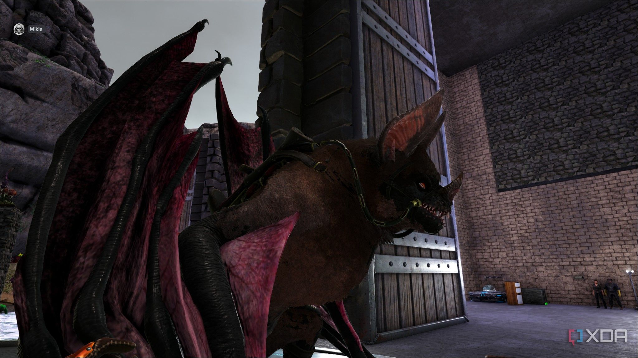 a desmodus in front of a door in ark survival evolved