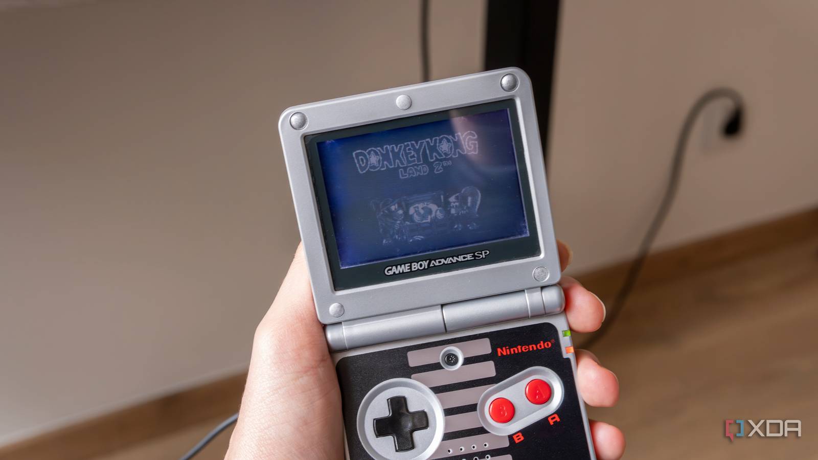 A Game Boy Advance SP playing Donkey Kong Land 2
