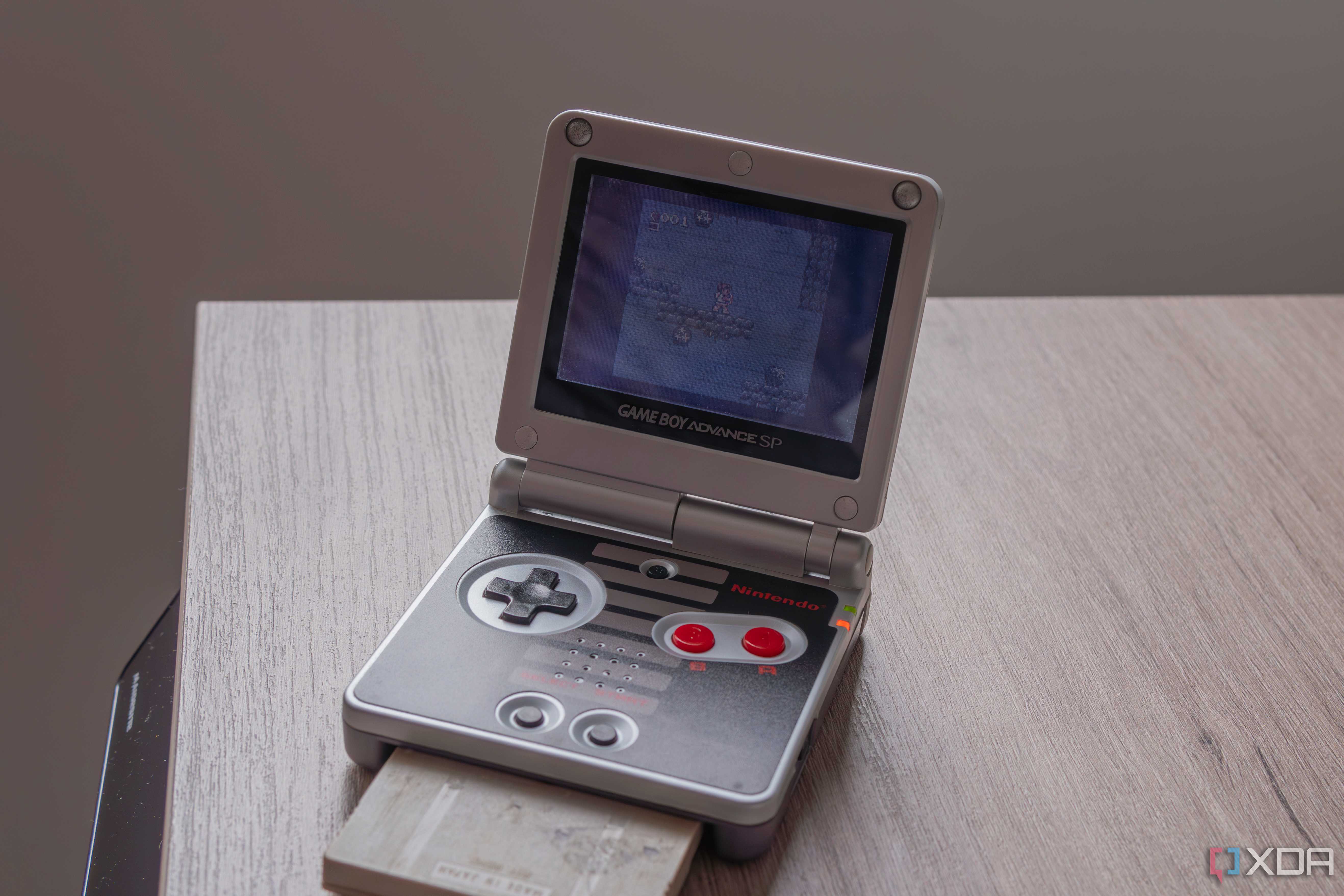 A Game Boy Advance SP running Kid Icarus Of Myths and Monsters