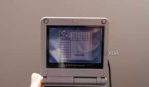 A Game Boy Advance SP playing the Game Boy game Mario's picross