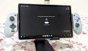 An image of an extended Gamesir Galileo G8 holding a Samsung S6 Lite Tablet.