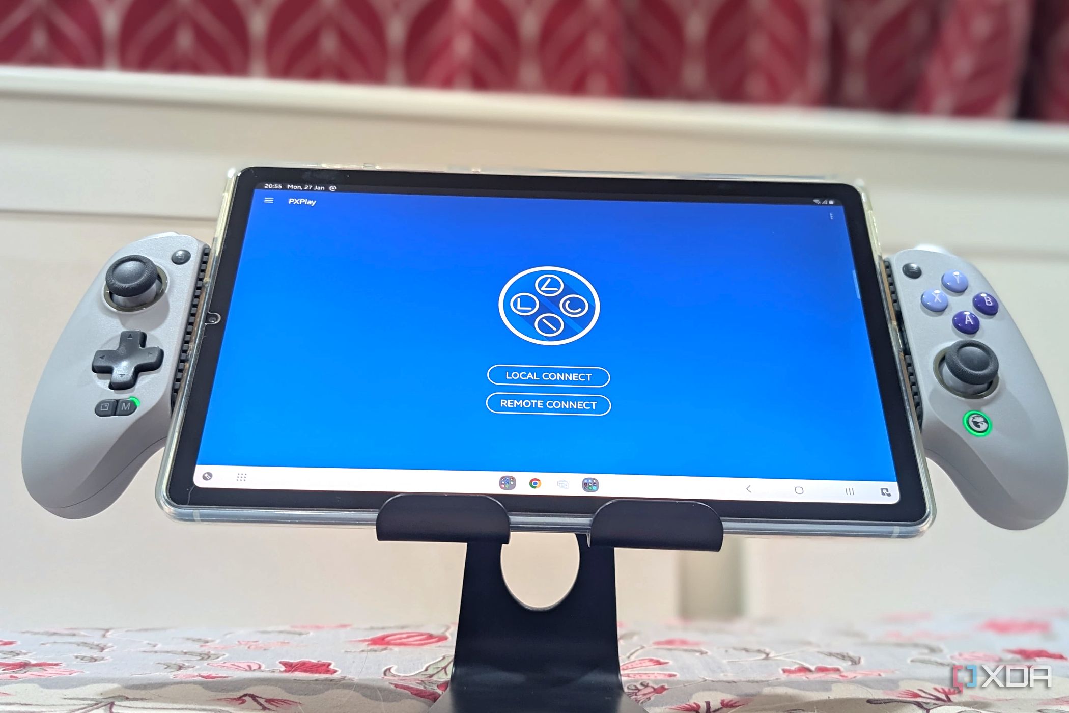 An extended grey Gamesir Galileo G8 controller holding a Samsung S6 Lite Tablet, with the app PX Play running on it.