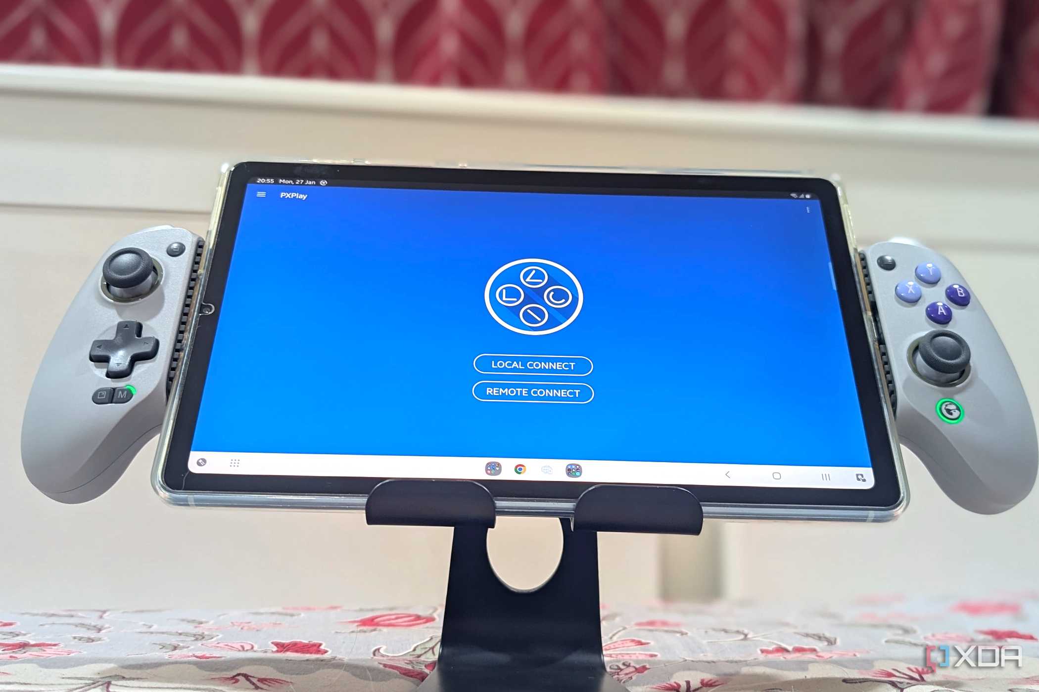 An extended grey Gamesir Galileo G8 controller holding a Samsung S6 Lite Tablet, with the app PX Play running on it.