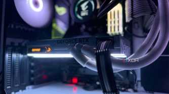 A white NVIDIA GeForce RTX 4090 inside a gaming PC