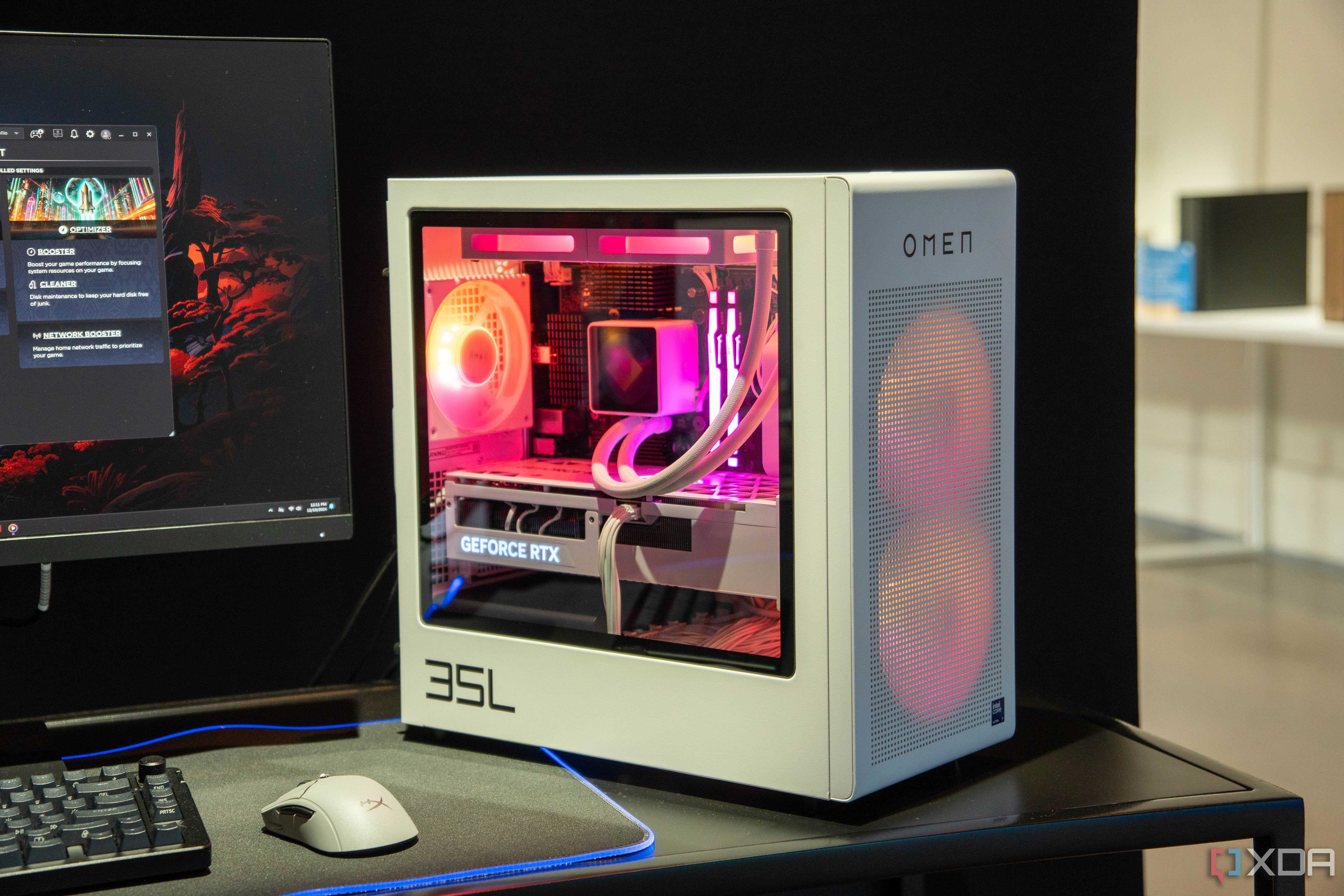 A white PC case with a mesh front and clear side panel showing well-illuminated components
