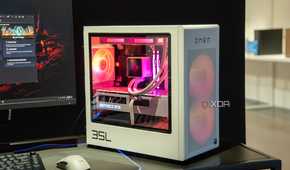 A white PC case with a mesh front and clear side panel showing well-illuminated components