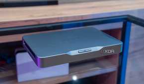 Angled view of the Khadas Mind AI Dev Kit on a glass table