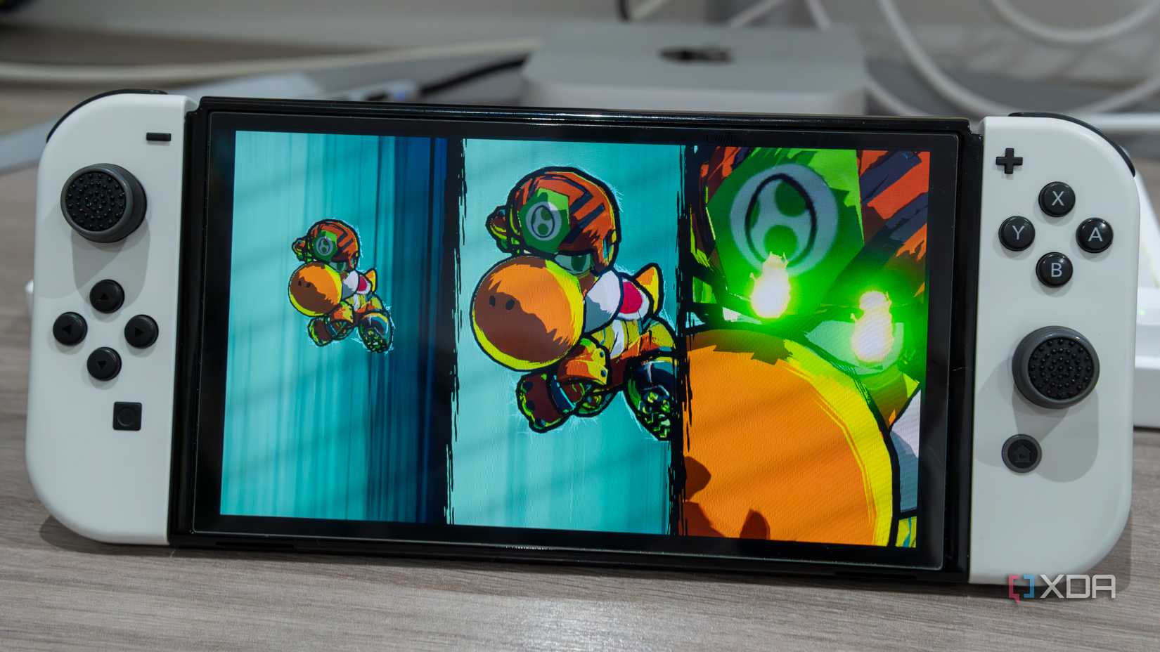 A Nintendo Switch OLED model running Mario Strikers Battle League