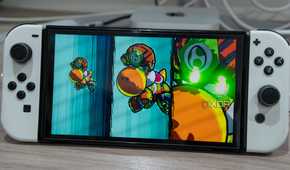 A Nintendo Switch OLED model running Mario Strikers Battle League