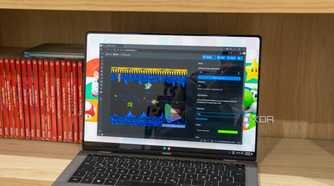 A Windows 11 laptop running PhotoStack in the Vivaldi browser