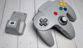 Rumble pak beside a Nintendo 64 controller