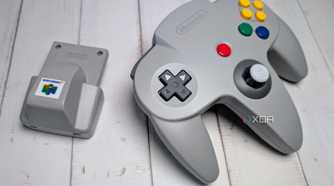 Rumble pak beside a Nintendo 64 controller