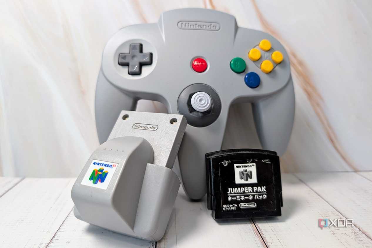 Nintendo 64 contoller with rumble pak and jumper pak