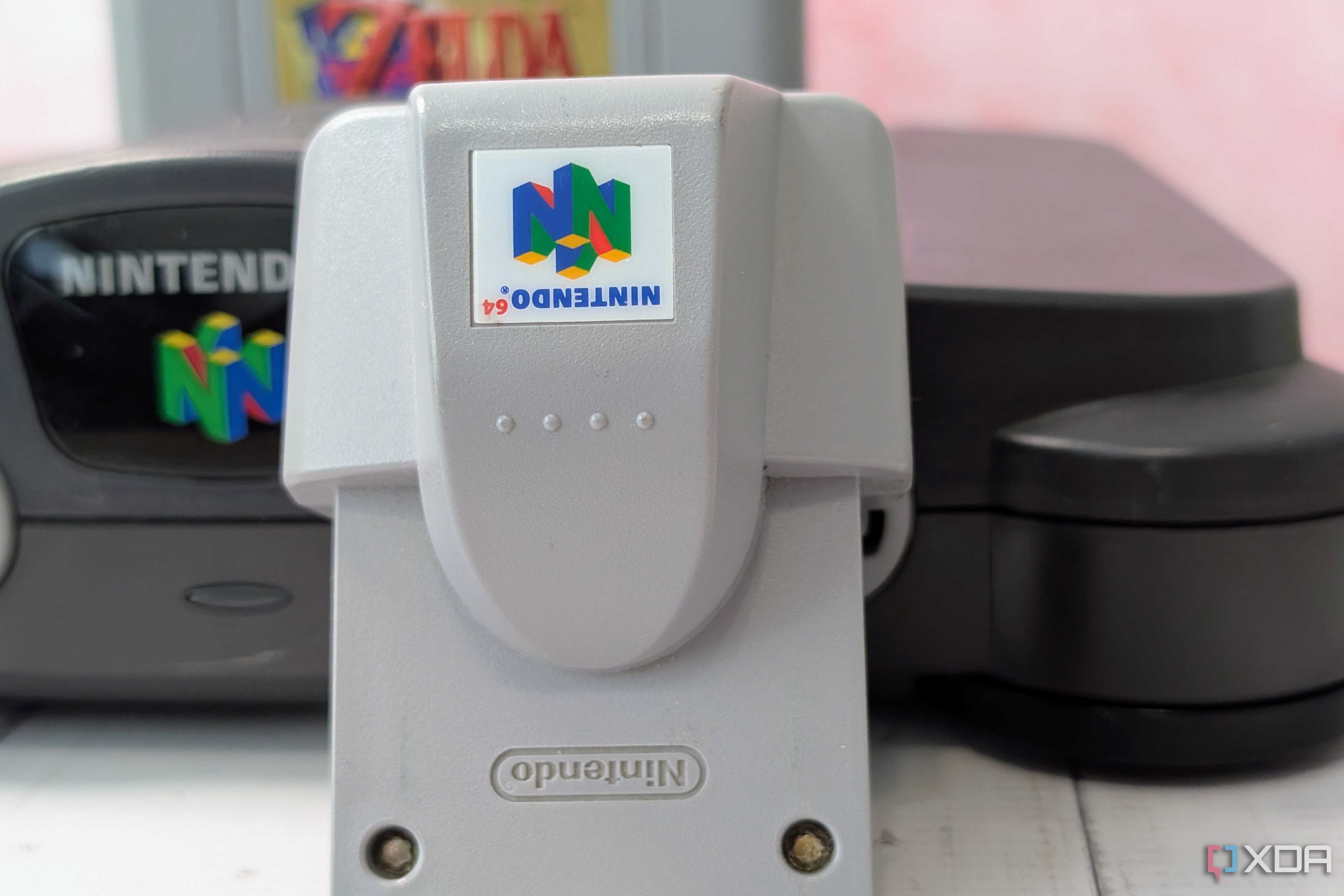 Rumble Pak with Nintendo 64 console in background