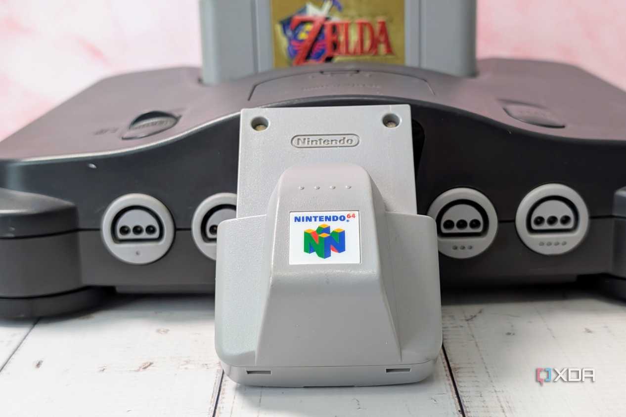 Rumble Pak for N64 with Nintendo and game in background