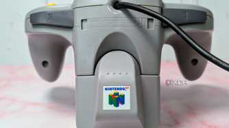 Nintendo 64 controller with Rumble Pak attachement