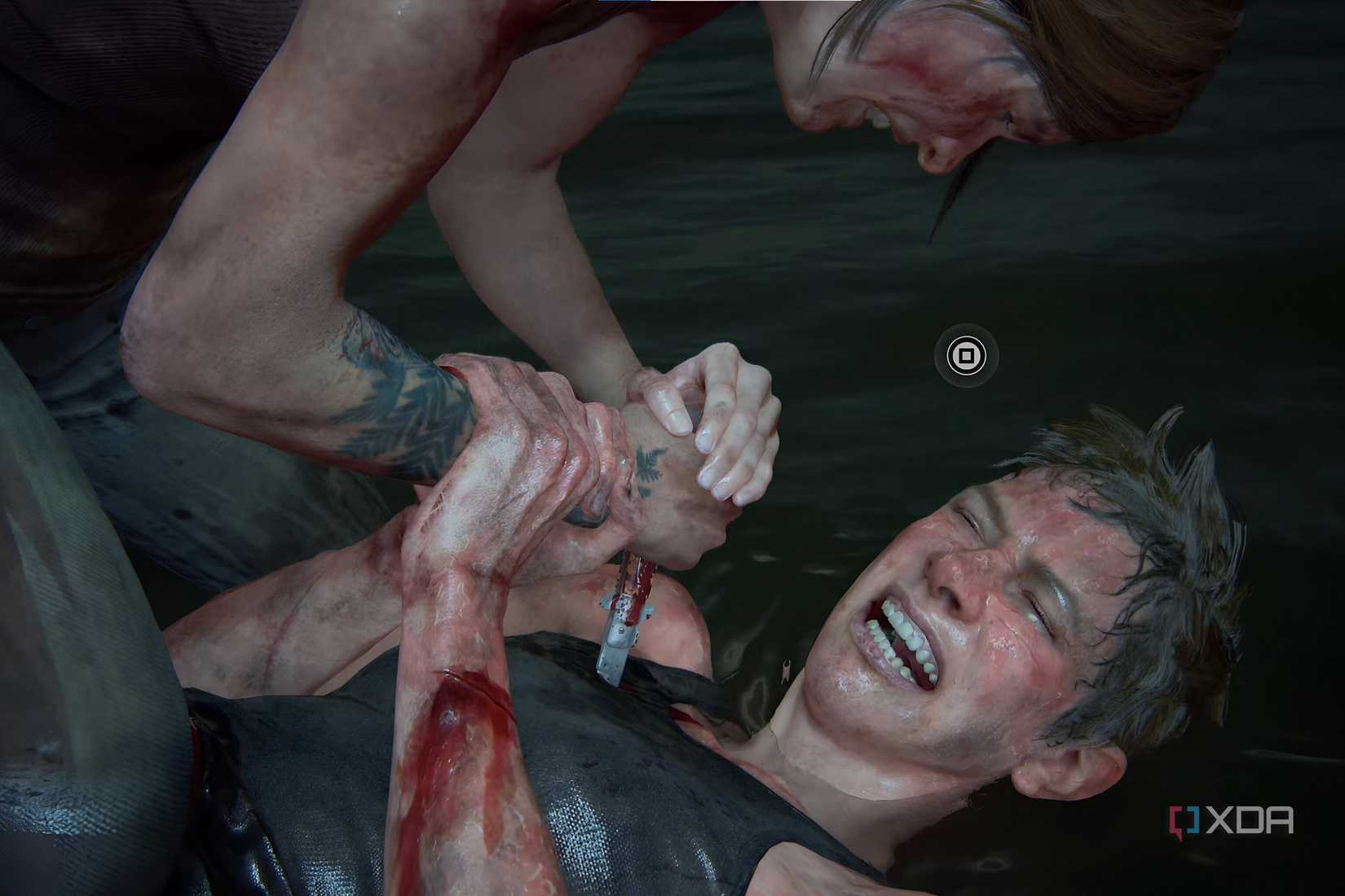 An image from the game The Last of Us Part II, showing two women fight as one stabs the other with a knife.