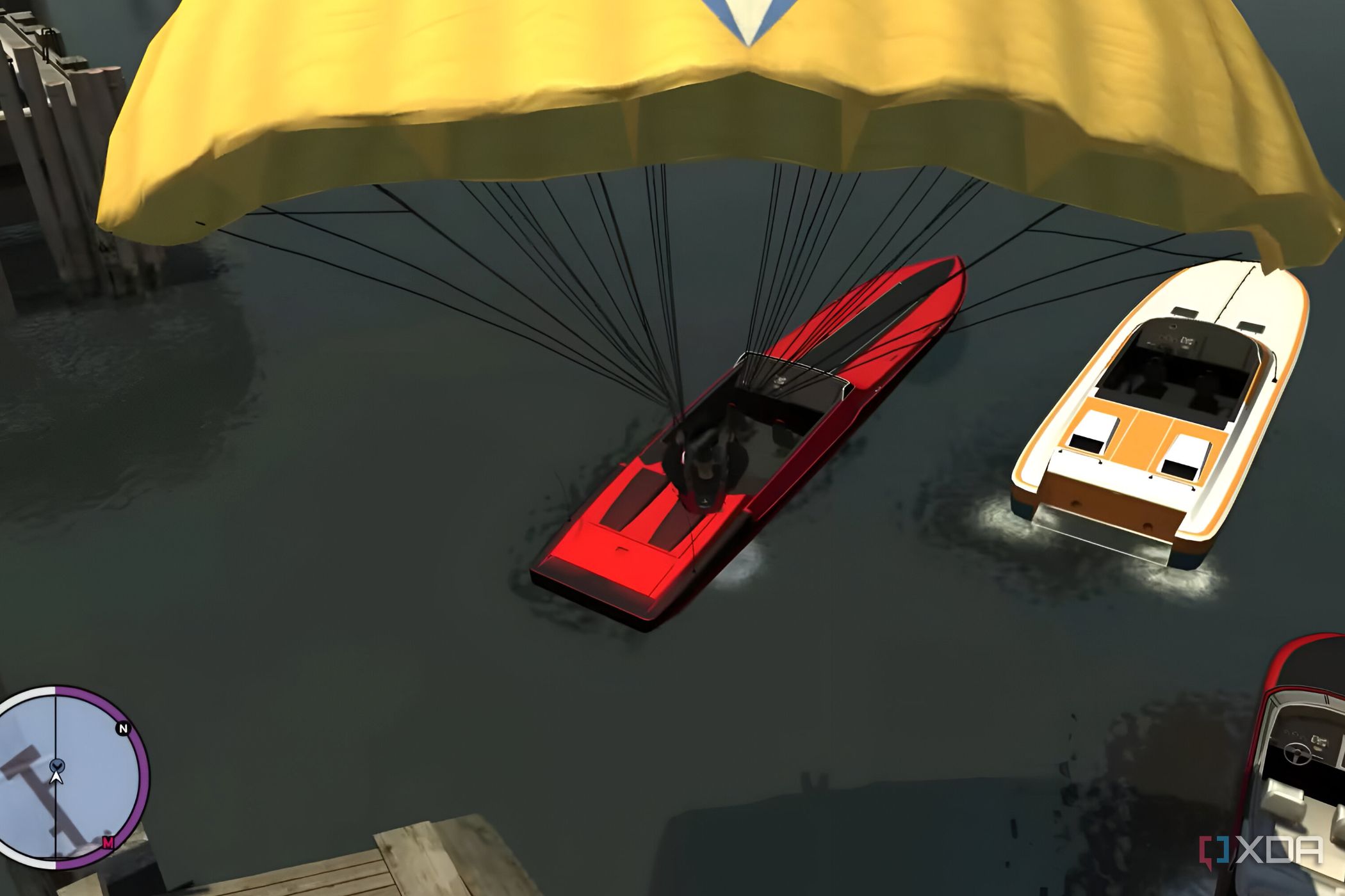 A screenshot from GTA IV: The Ballad of Gay Tony, showing a character parachute into a red boat parked in water.