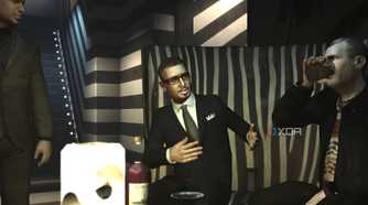 A screenshot from GTA IV: The Ballad of Gay Tony, showing three characters in suits conversing in a club.