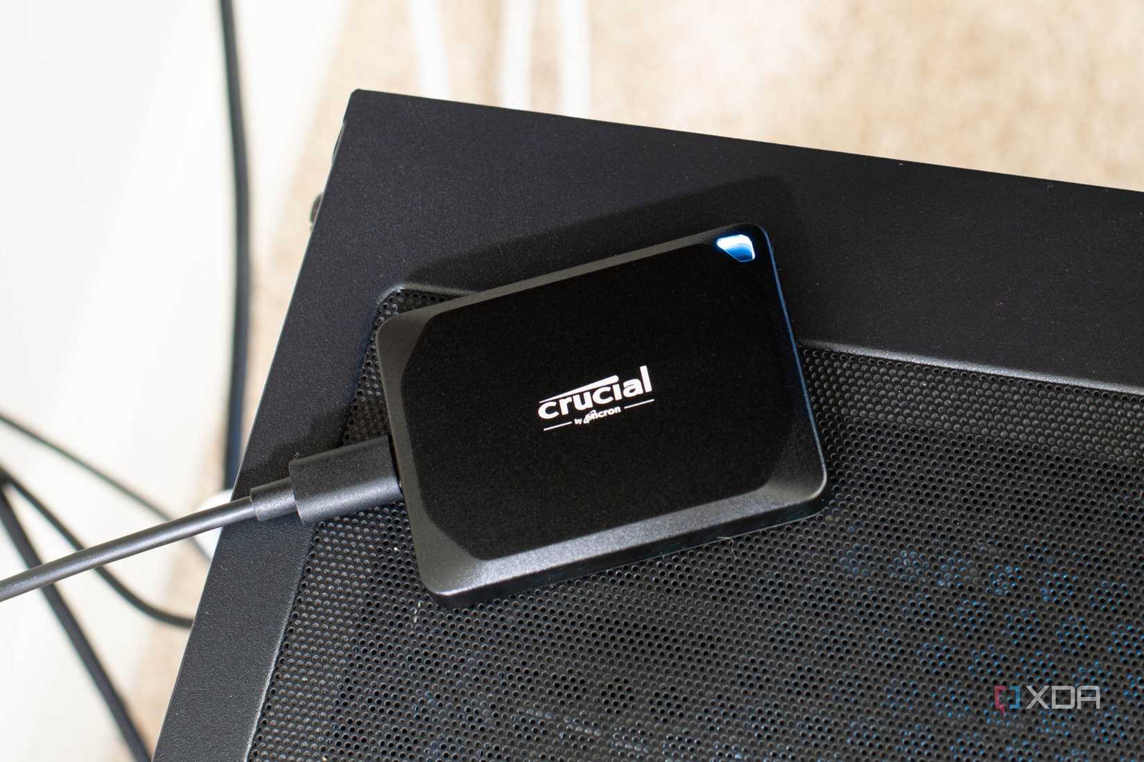 An image of the Crucial X10 Pro on a PC tower.
