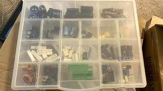 Electronic components in a plastic organizer