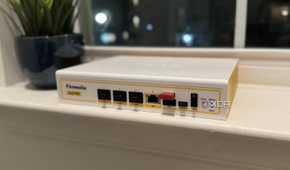 firewalla gold pro hardware firewall on a windowsill