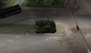 A tank driving past a destroyed bus and causing mayhem in the street