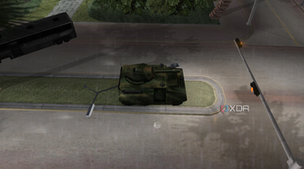 A tank driving past a destroyed bus and causing mayhem in the street