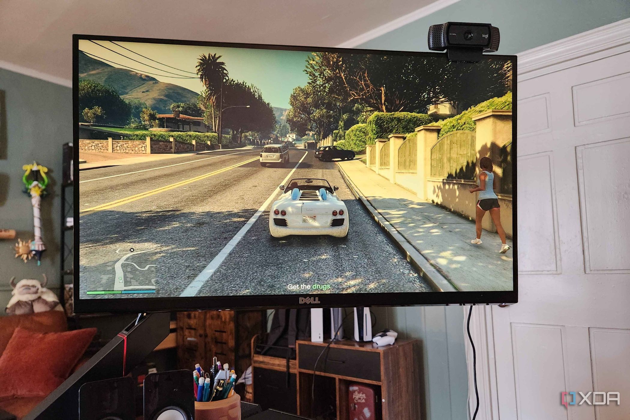 GTA V playing on computer screen in office