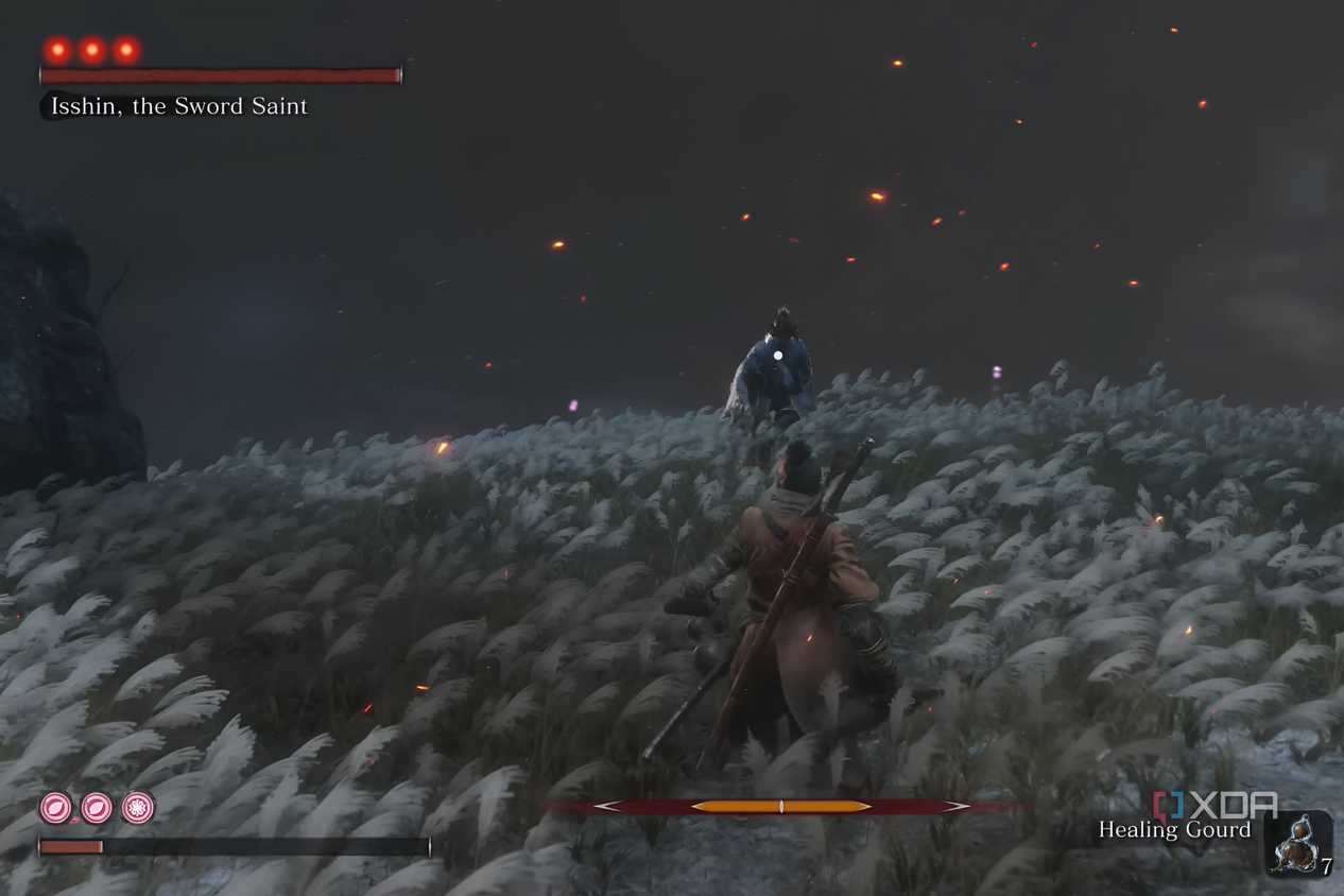 An image from the game Sekiro: Shadows Die Twice, showing Sekiro in red, fight Isshin draped in blue.