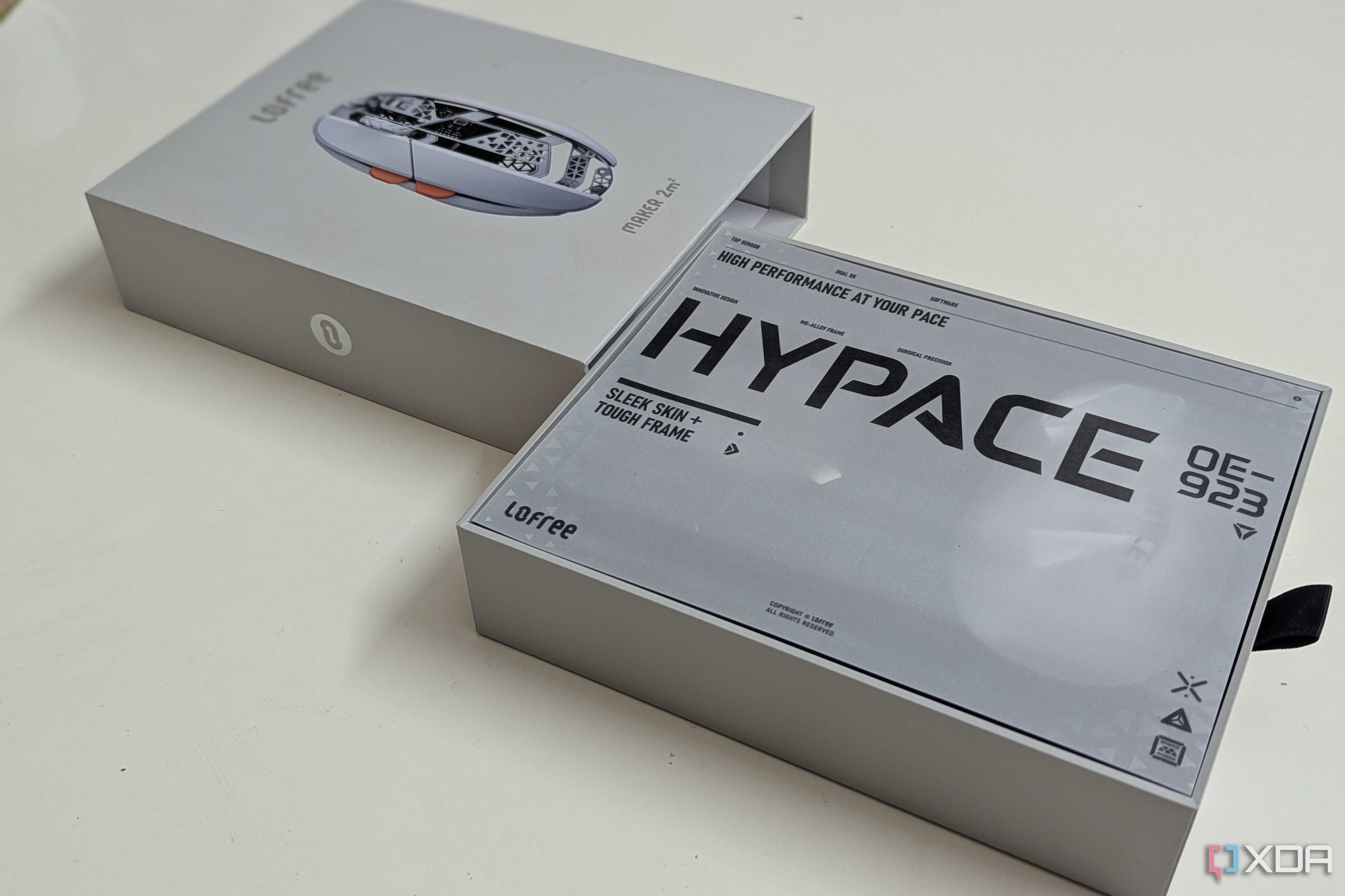 Open box of a gaming mouse on a white table