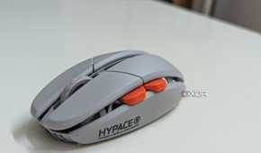 Side view of a gaming mouse showing the side buttons and scroll wheel