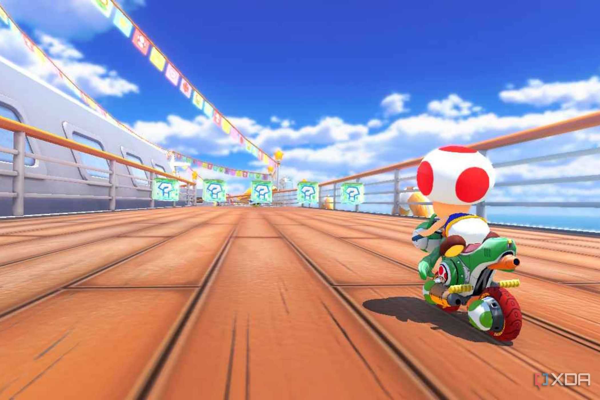 Mario Kart 8 Toad grabbing item on ship deck