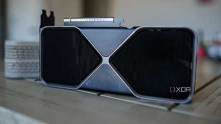 The RTX 5070 graphics card fans sit on the table facing out.