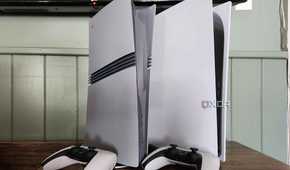 PlayStation 5 consoles on table with controllers